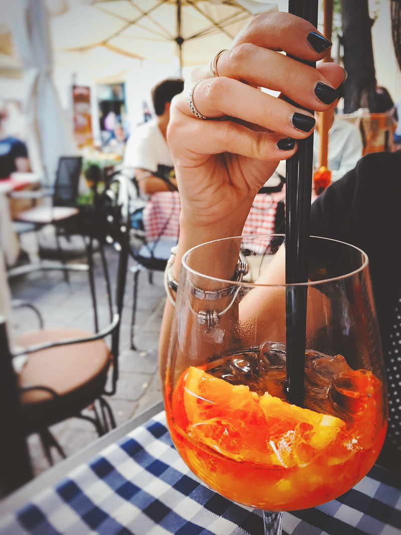 lifestyles, human body part, liquid, table, finger, food and drink, person, refreshment, juice, drinking glass, real people, straw, red wine, adult, freshness