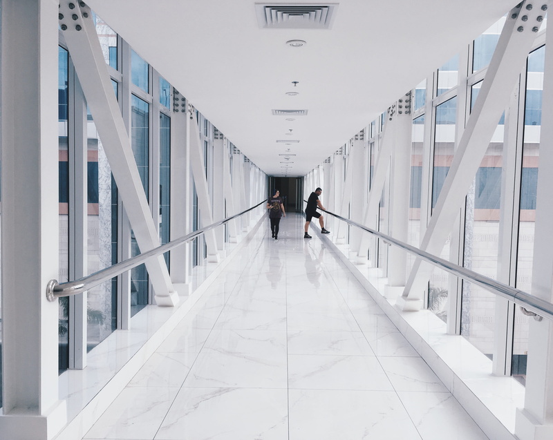 corridor, mobilechallenge, window, near, women, men, day, people, glass, arcade, architecture, couple - relationship, two, full length, the way forward