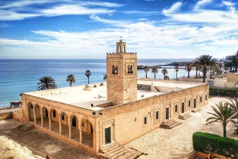 water, concrete, mosque, building exterior, horizon, the past, beside, white, horizon over water, outdoors, town, history, building, seashore, tropical climate