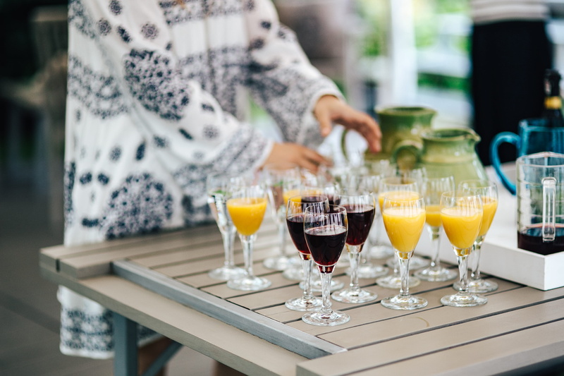 bar counter, Glasses, happy hour, one person, party, focus on foreground, day, alcohol, glass - material, unrecognizable Person, cocktail, orange, selective Focus