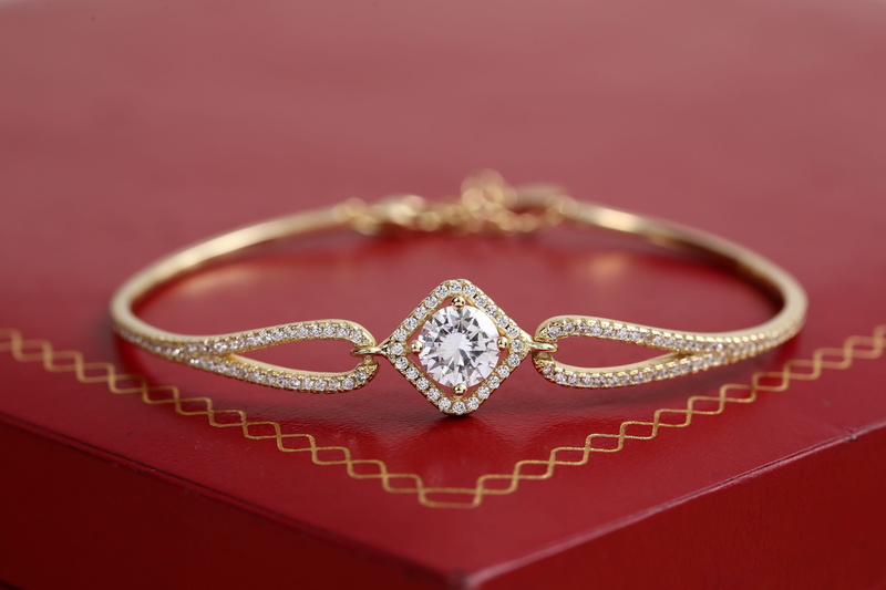 wealth, gold jewelry, love, indoors, close-up, event, heart shape, no people, high-end jewelry, gold, gold colored, red background, expense, gold and diamonds