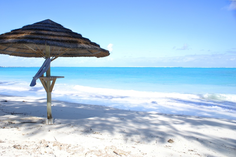 tranquil scene, no people, sunshade, beach umbrella, hot, ocean, beach, water, near, 2K, caicos islands, sand, parasol, sunlight, sun, nature, horizon