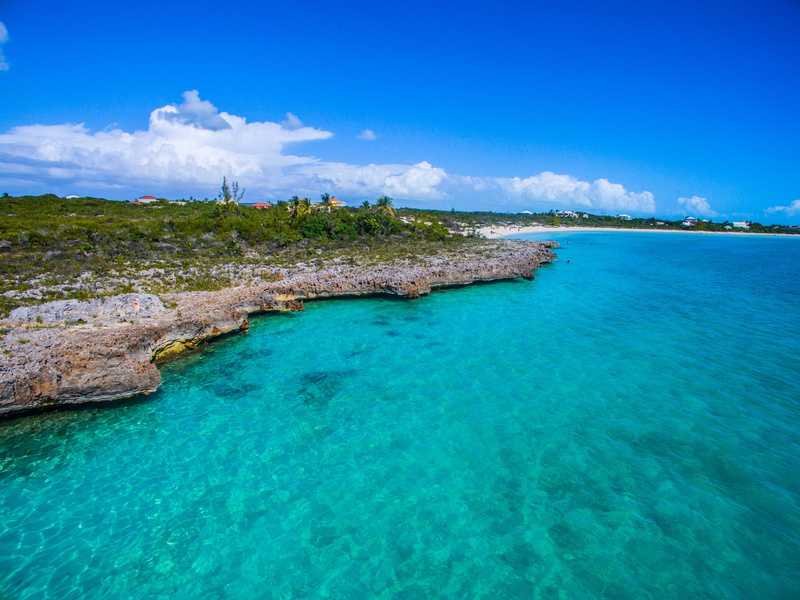 sand, rock - object, tranquil scene, lagoon, sea, land, water, island, bay, rock, trip, turks and caicos islands, vacation, no people, tranquility, outdoors