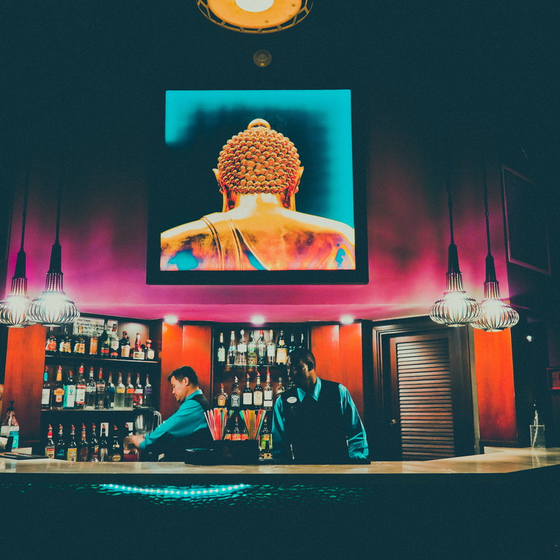 people, representation, alcohol, vodka, real people, human representation, square, bottles, colorful, sitting, restaurant, illuminated, casual clothing