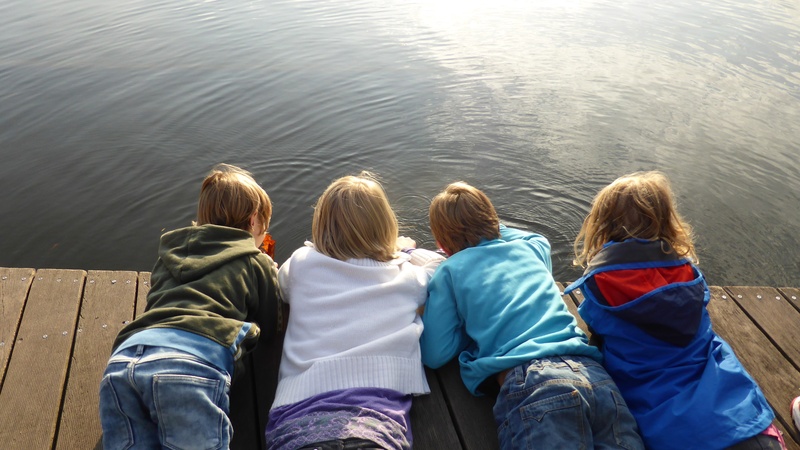 rear view, mind, girl, casual clothing, sitting, people, autumn game, leisure activity, dock, real people, childhood, four, toddlers, hair, near, outdoors
