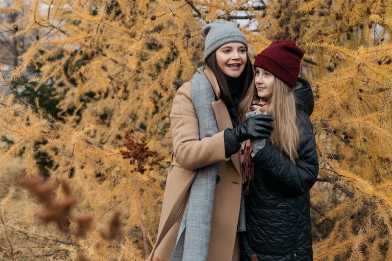 adult, beautiful, warm clothing, white, family, young women, cap, young adult, togetherness, grown up, woman, happiness, emotion, teen, smile, city, change