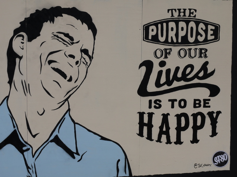 art, indoors, text, message, happy, slogan, low angle view, poster, creativity, female likeness, purpose, artistic, day, human representation, representation