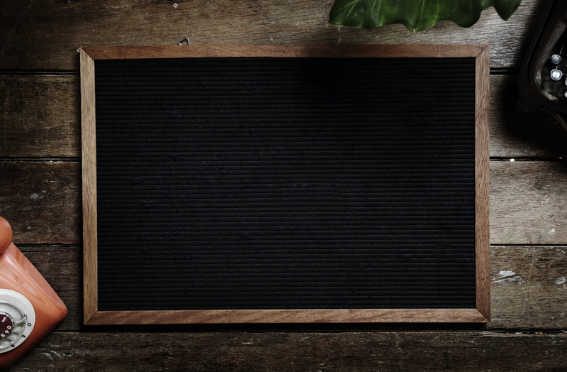 directly above, wall, frame, picture frame, indoors, wood - material, empty, holding, day, chalkboard, home interior, high angle view, one person, shape