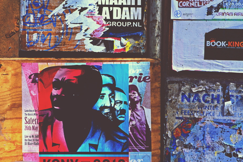 male likeness, human representation, poster, collage, graffiti, built structure, multi colored, wood, architecture, amsterdam, prints, communication, street