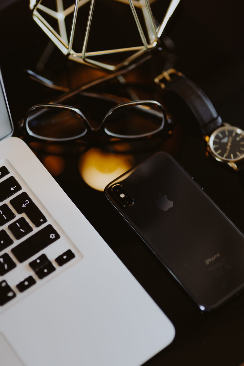gold frame, connection, work, iphone, communication, computer keyboard, personal accessory, glasses, wireless technology, screen, elegance, tech, mobile phone