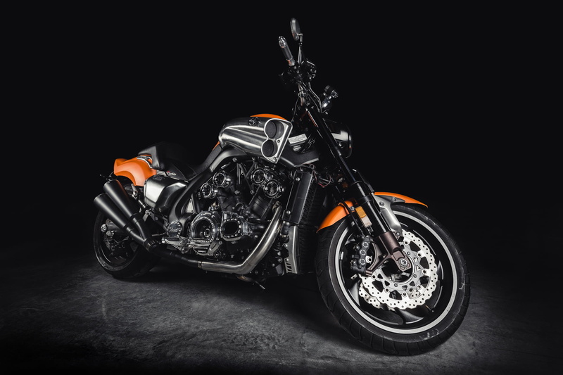 land Vehicle, orange, biker, indoors, single object, engine, shiny, reflection, black background, speed, tire, v max, yamaha, close-up, mode of Transport