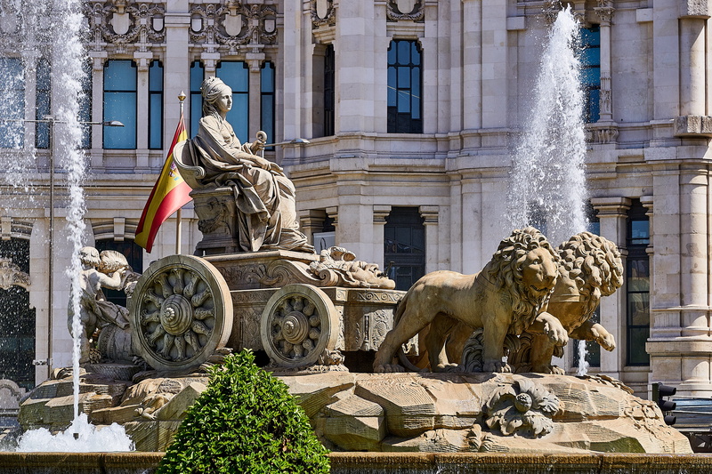 male likeness, riding, architectural column, lions, building exterior, places of interest, travel destinations, spain, architecture, fountain, historically