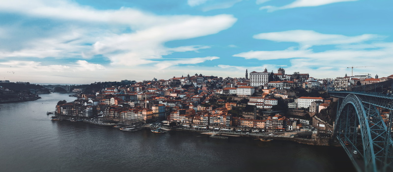 nature, outdoors, lake, porto, buildings, bridge - man made structure, cityscape, blue sky, office building exterior, transportation, horizon, city, boats