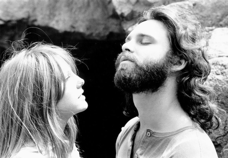 music, real people, young women, couple - relationship, bonding, adult, men, young men, facial hair, beard, Jim Morrison, portrait, hairstyle, hair, focus on foreground