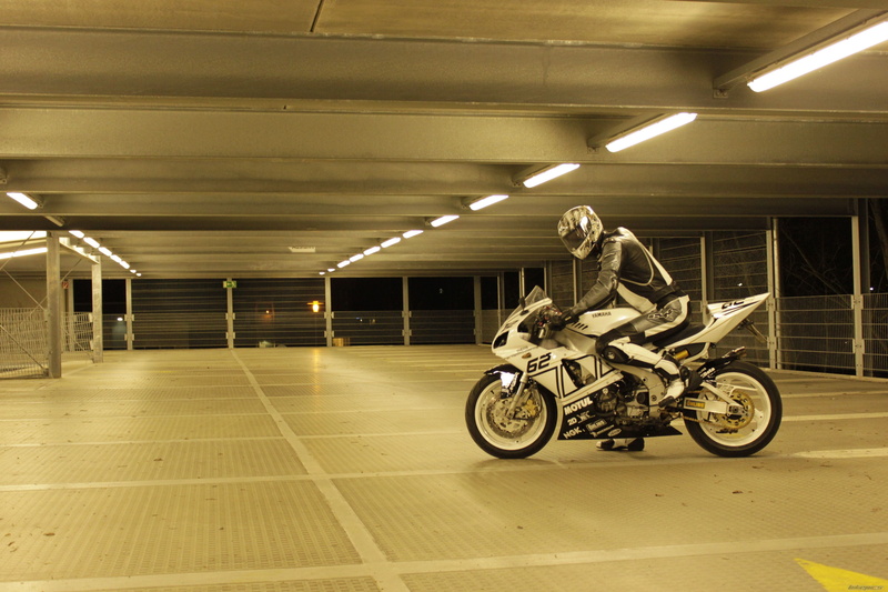 illuminated, tiled floor, building, built structure, black, parking, land vehicle, bike, flooring, architecture, motorcycle, parking lot, sport, Yamaha