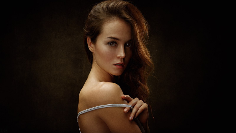 tanned, simple background, face, Anastasia Zonova, women, Georgy Chernyadyev, portrait, brown eyes, 720P, bare shoulders, long hair, warm colors, brunette