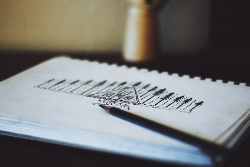 focus, handwriting, autograph, two objects, pen, indoors, desk, page, pencil, id cards, pad, calendar, shallow, open, communication, finger, simplicity