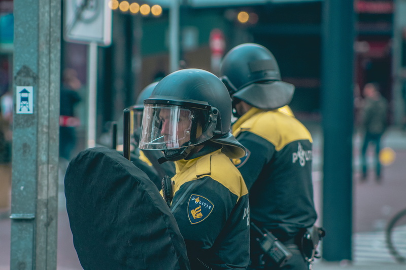 helmet, 5K, protective workwear, shield, security, riot gear, waist up, three, only men, rescue worker, two, real people, safety, headwear, polive, accidents and disasters