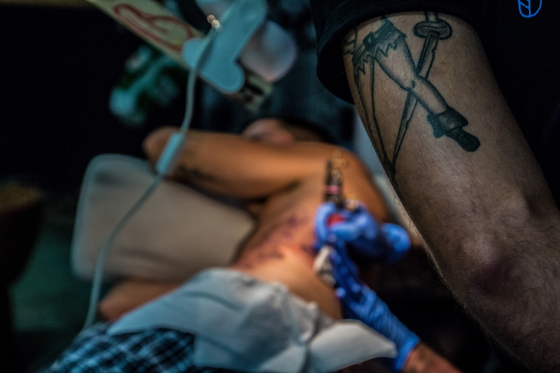 ink, Tattoo Artist, patient, studio, man, tool, Body, hand, people, indoors, Drawing, hospital, machine, occupation, needle, culture, color Image, fashion