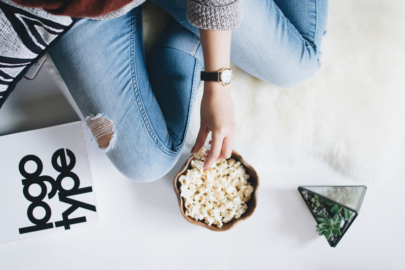 leisure activity, lifestyles, communication, human Hand, popcorn, woman, snack, bowl, adult, casual clothing, low section, females, people, table, indoors