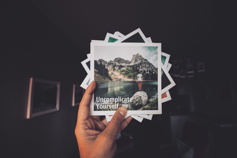 one person, photographs, uncomplicate, snaps, adults only, photo, holding, prints, items, phots, hold, dark, human hand, things, copy space, close-up, still