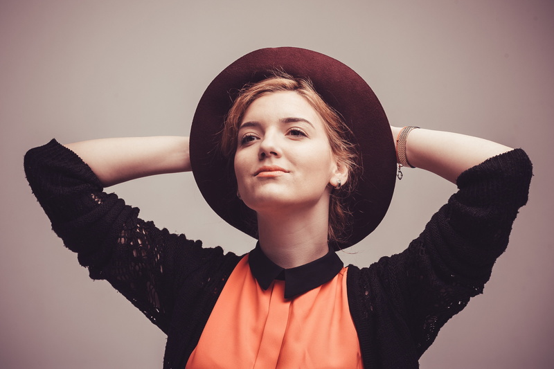 human body part, about, lifestyles, standing, hat, caucasian Ethnicity, studio, black, people, in relation to, shirt, beauty, females, young Adult, only women