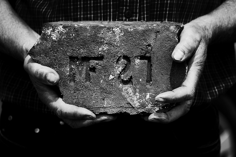clay, the number of the, artist, real people, exertion, one, adult, house, leisure activity, person, black and white, making, body weight, the hands, holding