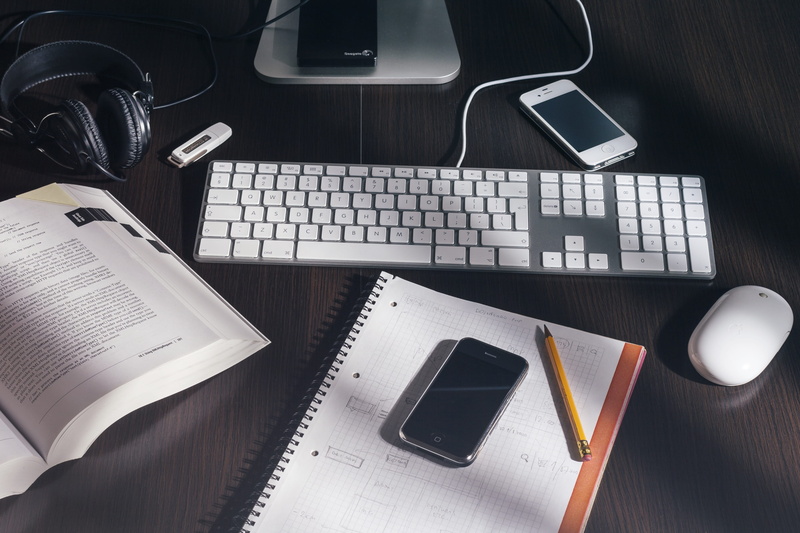 keyboard, desk, high angle view, publication, computer, study, indoors, reading, pen, business, connection, table, communication, furniture, laptop, no people