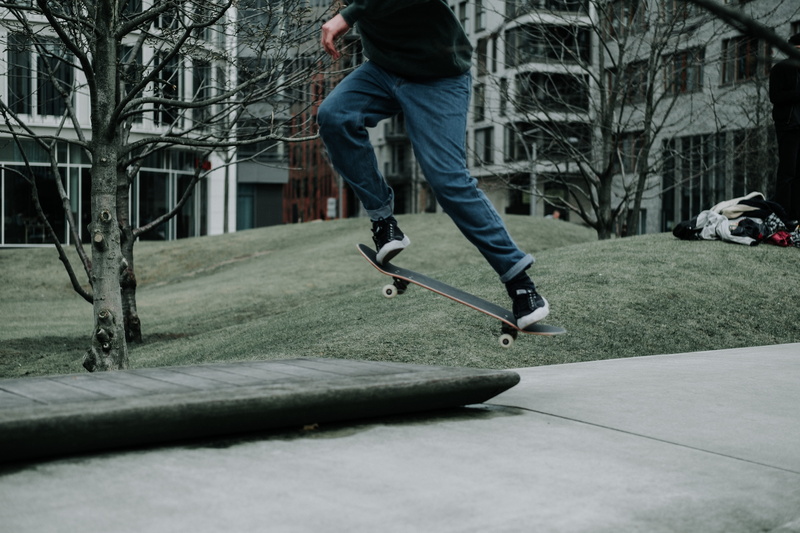 day, sport, motion, skatepark, tree, concrete, mid-air, person, trick, ledge, lifestyles, mid air, teen, stunt, park, real people, daytime, kick, outdoors