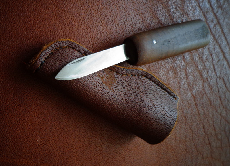swiss army knife, sport, household equipment, victorinox, sak, still life, leather, metal, sheat, brown, handle, single object, wood - material, directly above