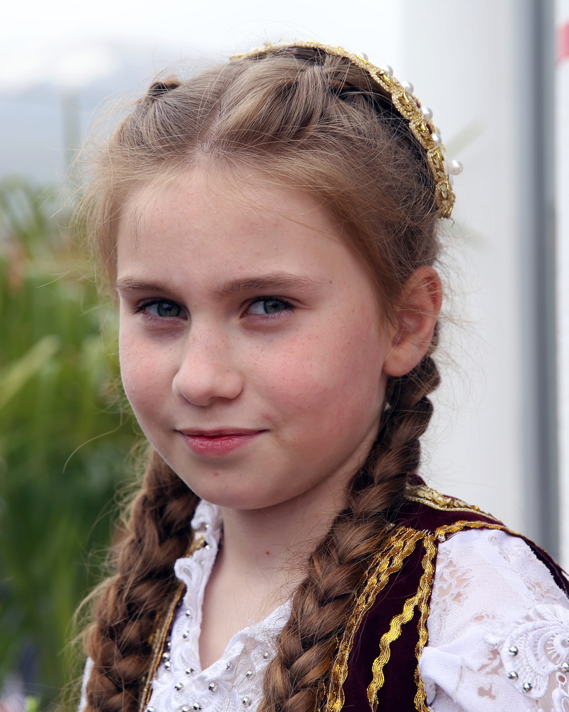 focus on foreground, 2K, portrait, brown hair, headshot, hair, teenager, hairstyle, innocence, one person, albania, childhood, traditional, child, looking at camera