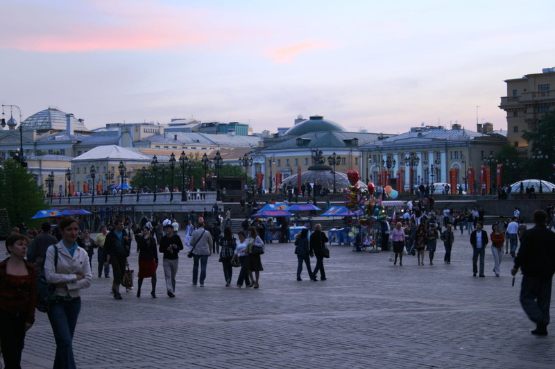 adult, arts culture and entertainment, red, outdoors, Pedestrian Street, walking, street, pedestrian, square, real people, sunset, off red square, city