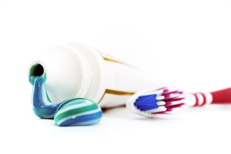plastic, studio shot, multi colored, child, red, macro, nobody, turquoise, preening, childhood, single, hand, people, toothbrush, sport, object, toothpaste