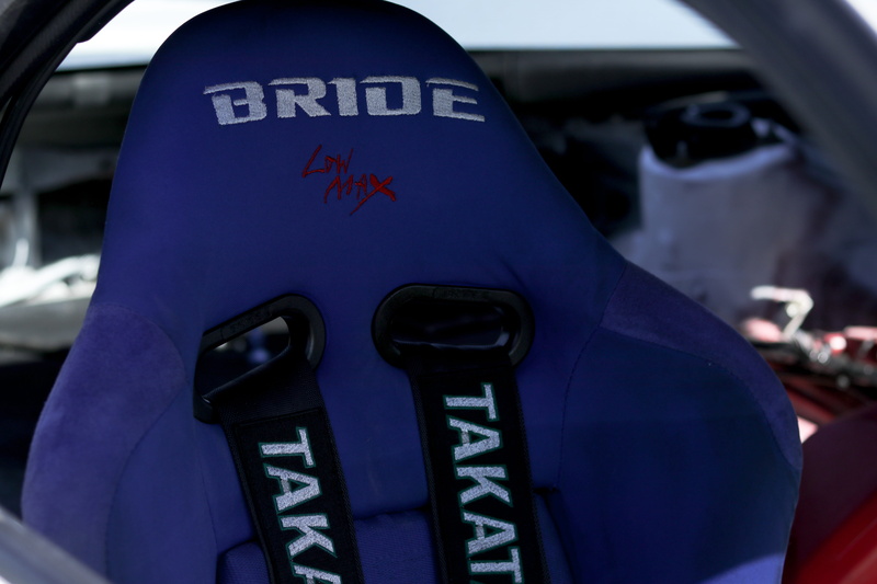 men, western script, takata, nissan, interior, 5K, rx7, cars, car, mazda, sign, motor vehicle, racecar, communication, focus on foreground, close-up, day