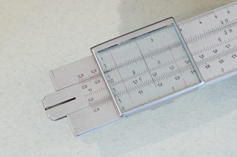 rule, studio shot, mathematics, still life, reiss, slide, aluminum, table, instrument of measurement, 5K, slide rule, high angle view, math, accuracy