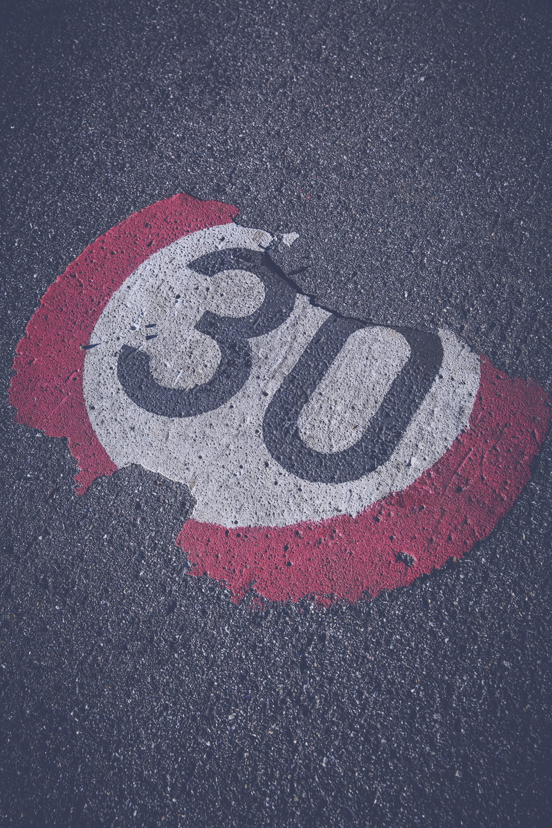 limit, shape, high angle view, symbol, road sign, speed limit sign, asphalt, thirty, no people, speed, transportation, grey, number, sign, circle, zone 30