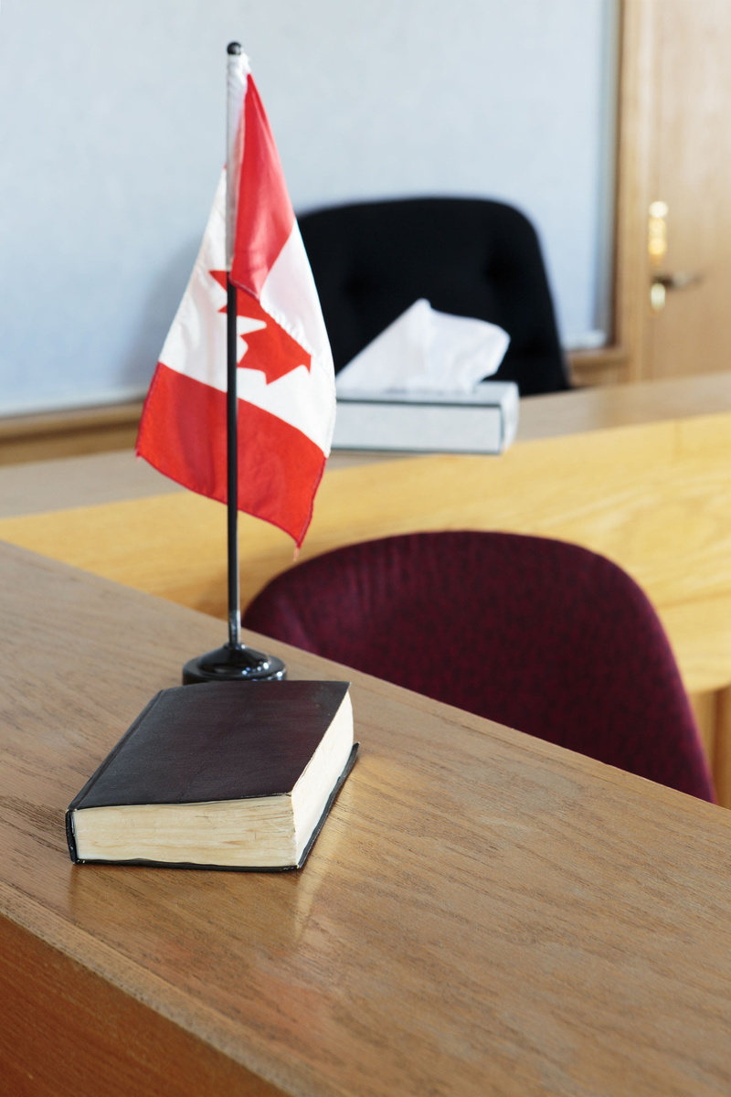 canadian, flag, chair, focus on foreground, rules, 2K, close-up, red, no people, absence, table, furniture, belief, seat, judgment, proceedings, architecture