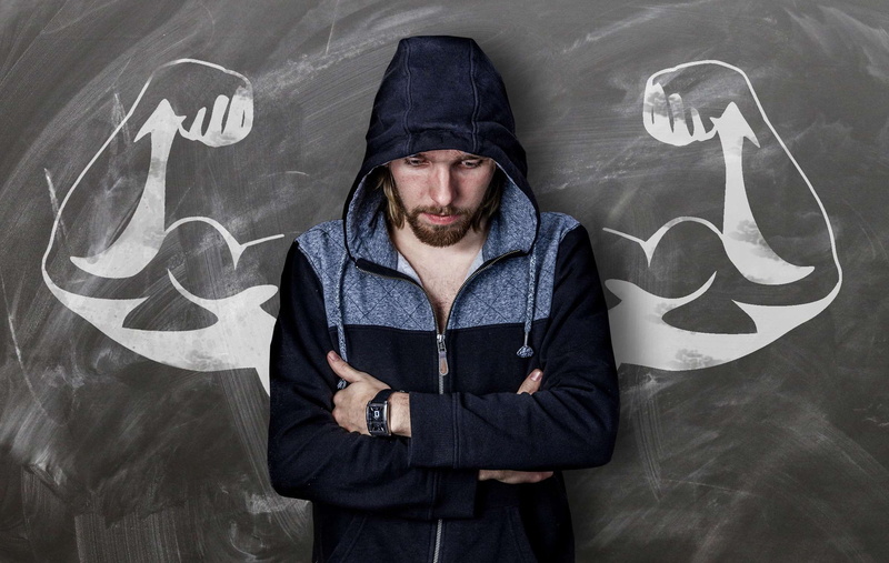 portrait, one person, disappointment, chalk, hooded shirt, dream, model, muscles, lifestyles, facial hair, adult, real people, young adult, pose, background
