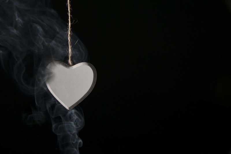 pendant, pollution, silver, black background, black, positive emotion, container, single object, indoors, heart, feeling, valentines day - holiday, romanticism