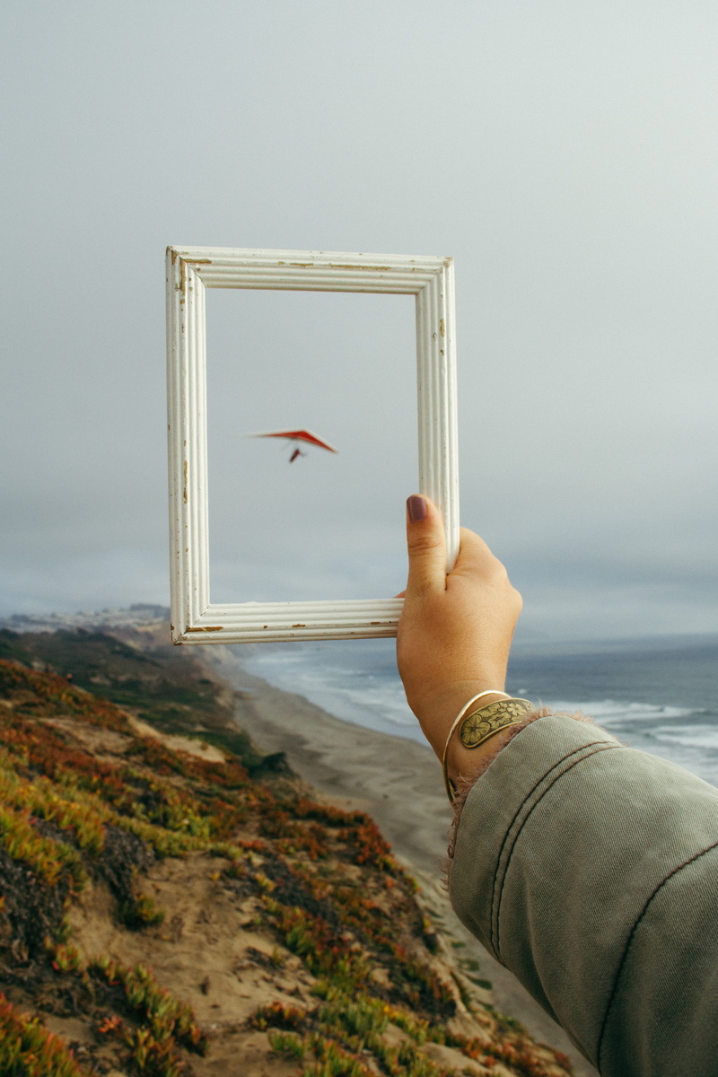 cliff, sand, finger, water, rectangular, mist, picture, cloud, beauty in nature, woman, formation, sea, handglider, human hand, lifestyles, white, nature