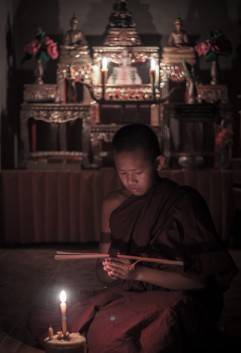 measure, buddhist, spirituality, one person, looking, real people, monks, sitting, tradition, people, faith, place of worship, candle, monk, young, boy
