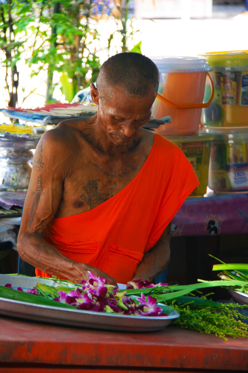 man, spirituality, waist up, peace, buddhist, front, indoors, casual clothing, peaceful, retail, preparing food, food and drink, religion, travel, thai