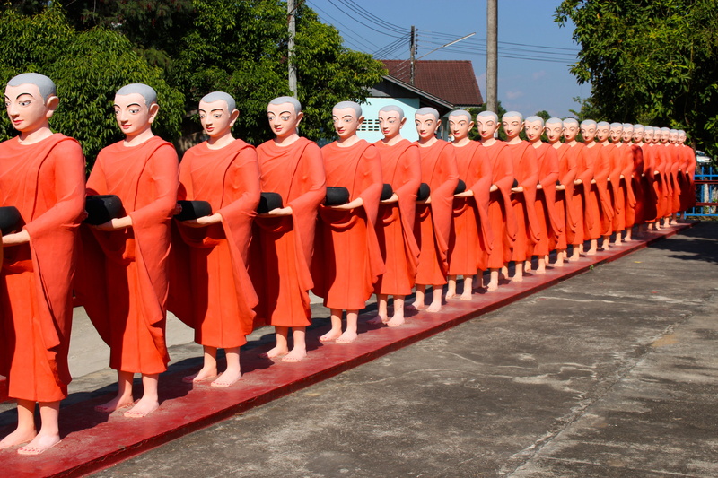 side by side, believe, uniform, outdoors, temple, walking, full length, nature, religion, repetition, day, buddhist, faith, belief, asia, real people, conviction