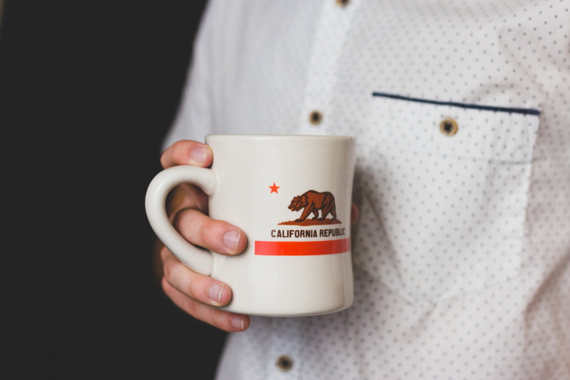 nail, design, food and drink, coffee cup, food, arts, focus on foreground, california, one person, bear, crockery, adults only, midsection, one man only