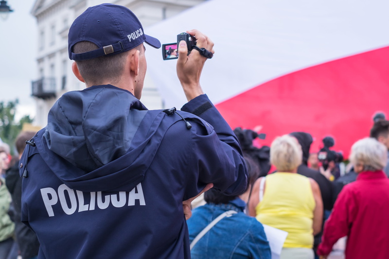 technology, equipment, safety, street, police force, law, security staff, watching, waist up, surveillance, clothing, outdoors, uniform, rear view, 2K