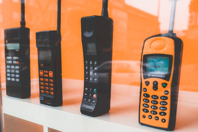 remote control, texting, electronics, orange color, close-up, business, calculator, electrical equipment, computer, technology, portable information device
