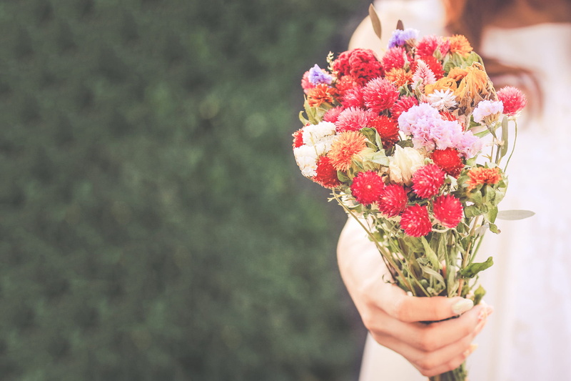 caucasian Ethnicity, flower, flower arrangement, gift, yellow, tilt, real people, bride, one Person, outdoors, red, finger, girl, flower head, beauty in nature