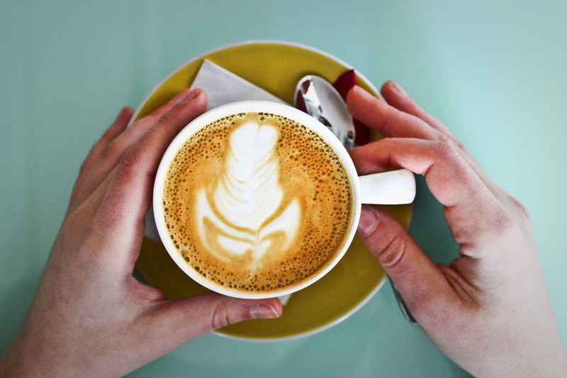 espresso, food and drink, drink, cappuccino, caffeine, adult, 2K, morning, paper, hands, food, breakfast, closeup, colored background, saucer, spoon, paper napkin