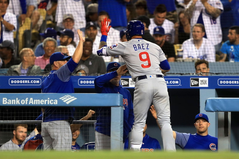 crowd, text, New Era, communication, match - sport, Joe Maddon, Major League Baseball, competition, lifestyles, clothing, Ian Happ, number, outdoors, Javier Báez