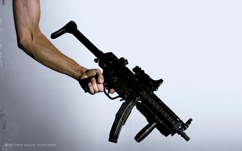 black, Nine Inch Nails, human limb, gray background, human body part, aggression, sign, indoors, rifle, gray, one person, hand, gun, weapon, machine gun